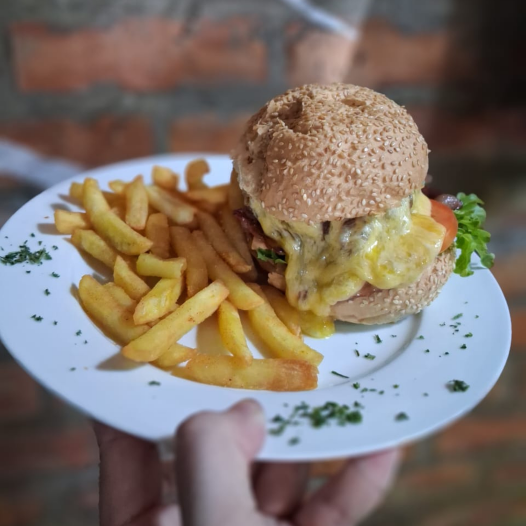 Homemade beef burger and fries at a local café in Gqeberha, Eastern Cape